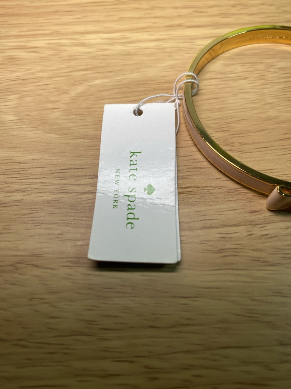 kate spade gold bangle with blush pink bow charm - Picture 2 of 5